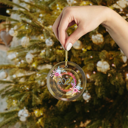 Hand holding Style 1 Glass year ornament.