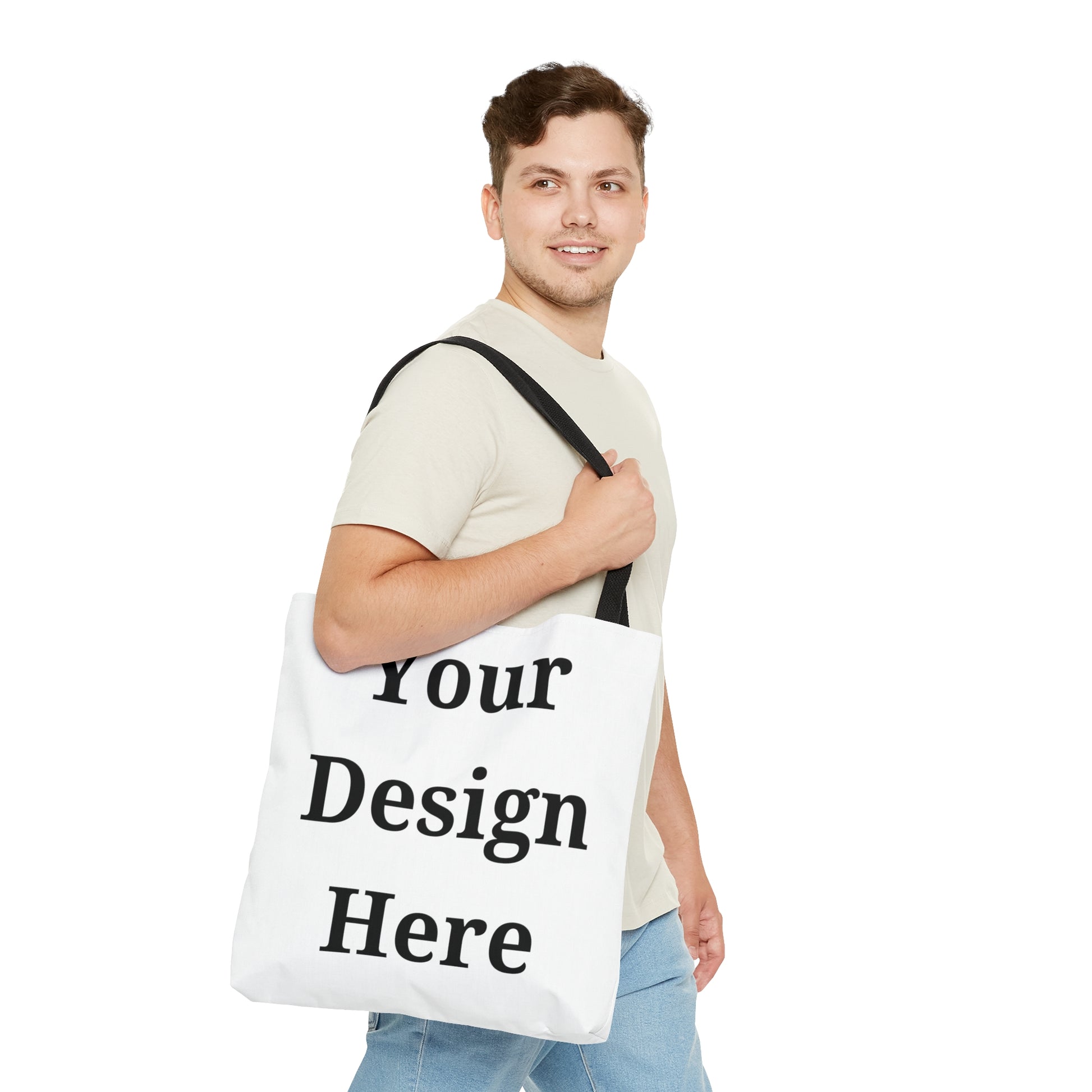 Man carrying large tote bag.