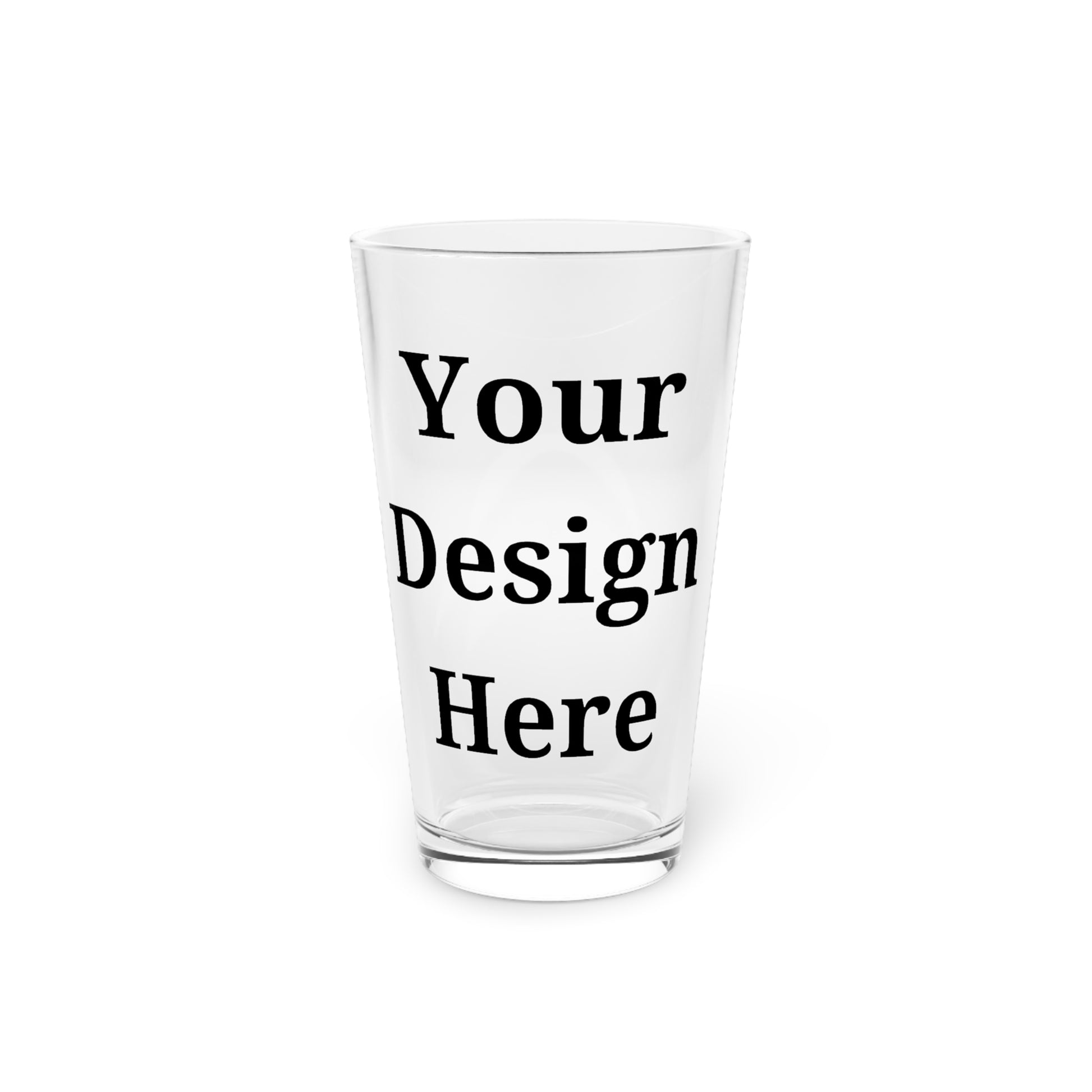 Clear pint glass featuring “your design here” front view.