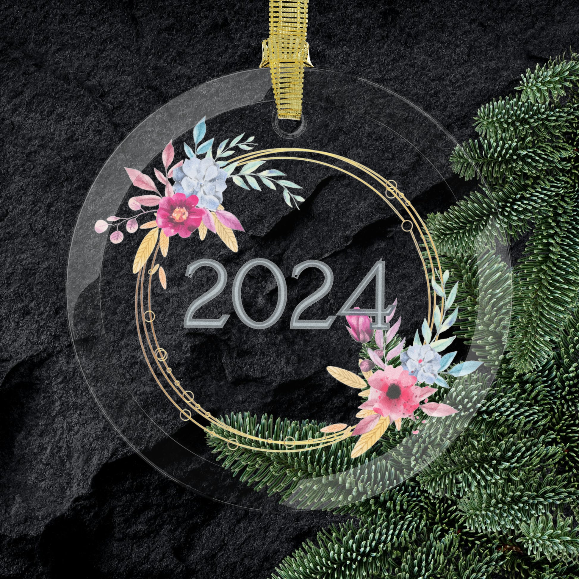 Style 7 Commemorative Year Glass Ornament in front of Christmas Branches.