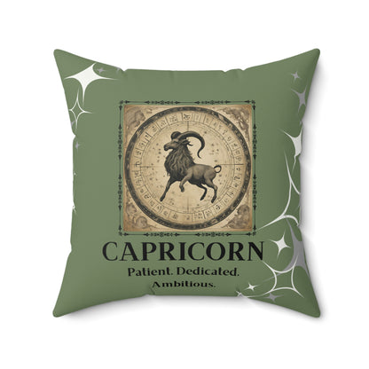 Capricorn pillow in Olive featuring zodiac symbol surrounded by white stars.