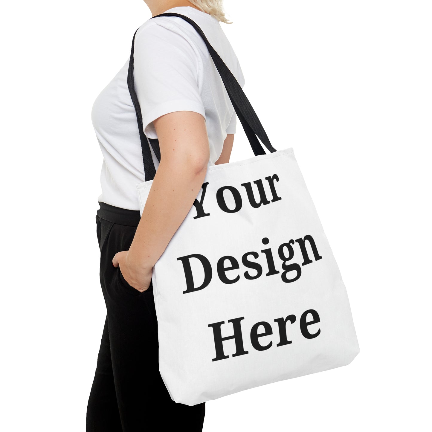 Woman carrying large tote bag.