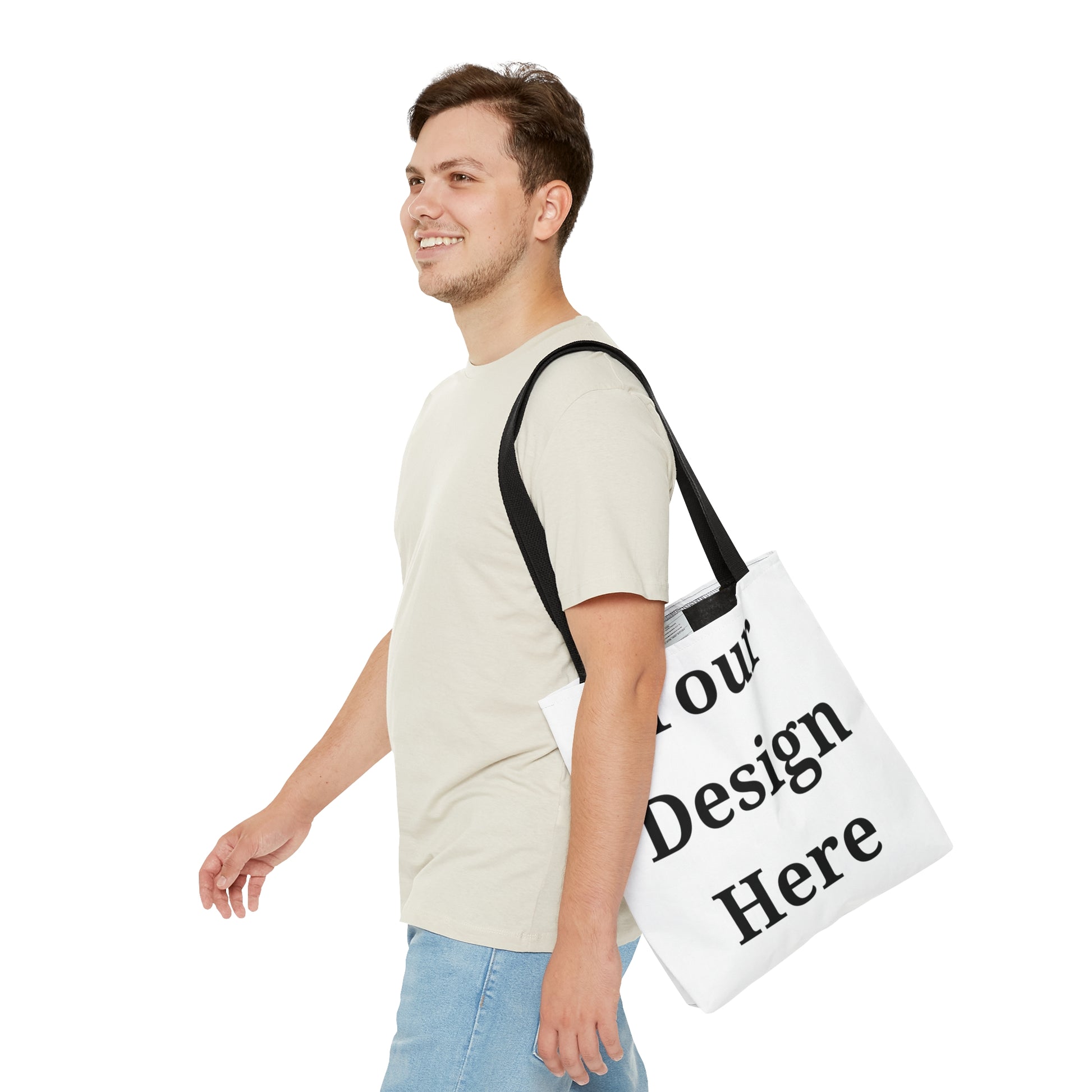 Man carrying small tote bag while walking.