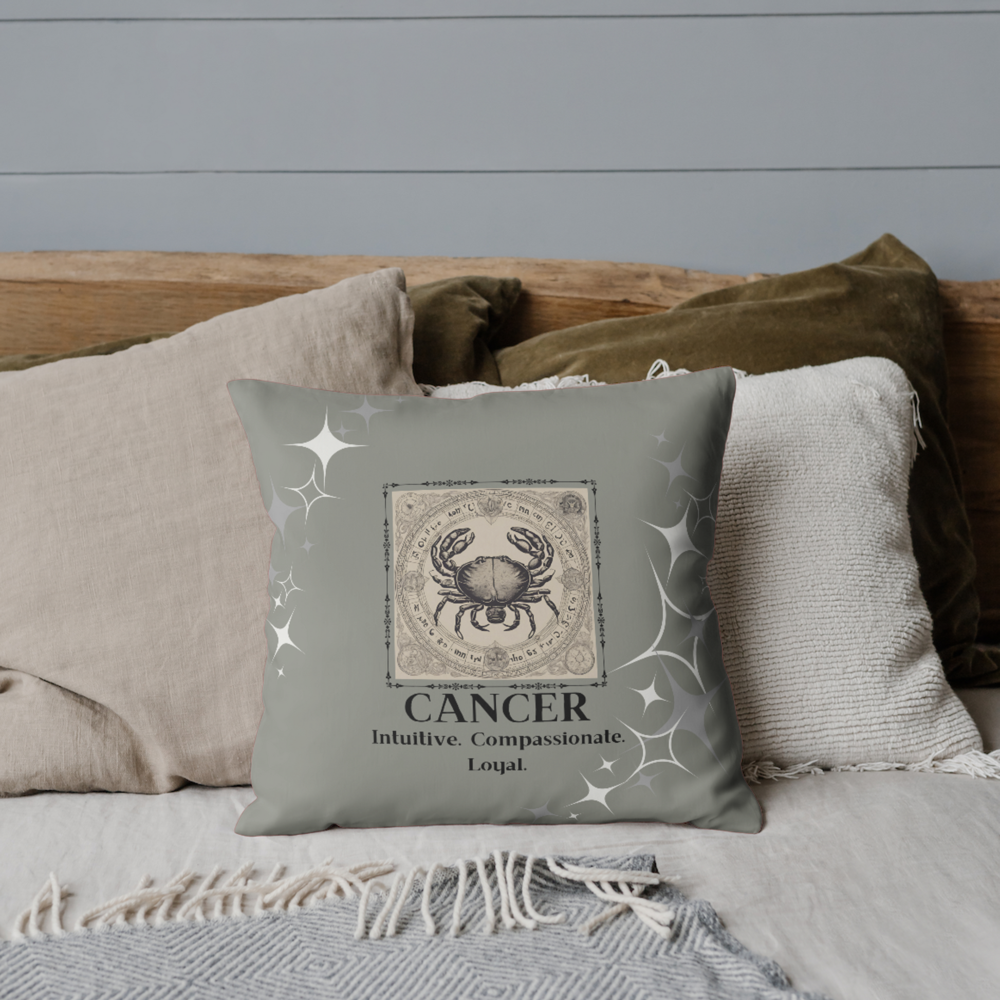 Zodiac throw pillow on bed in Smoke.