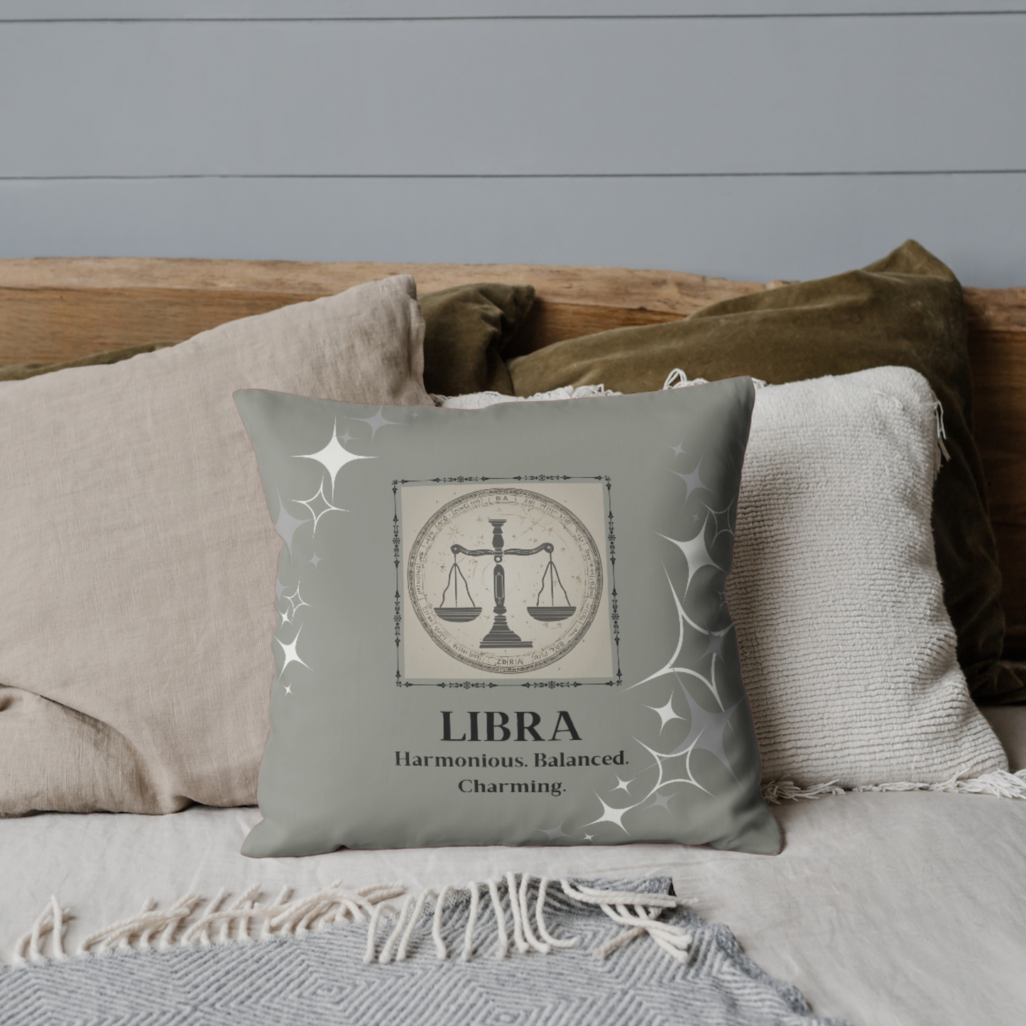 Libra Zodiac Throw Pillow on bed in Smoke.