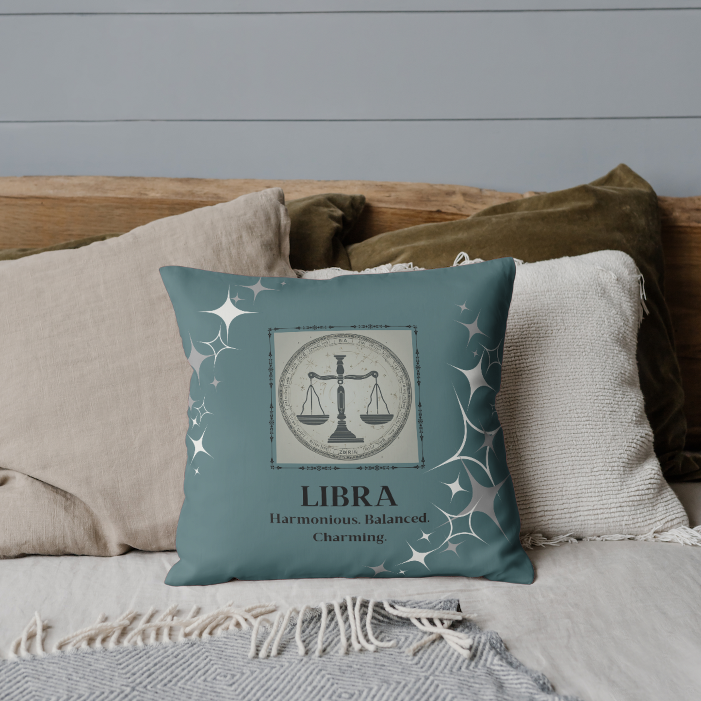 Libra Zodiac Throw Pillow on bed in Teal.