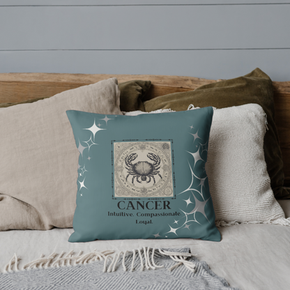 Zodiac throw pillow on bed in Teal.