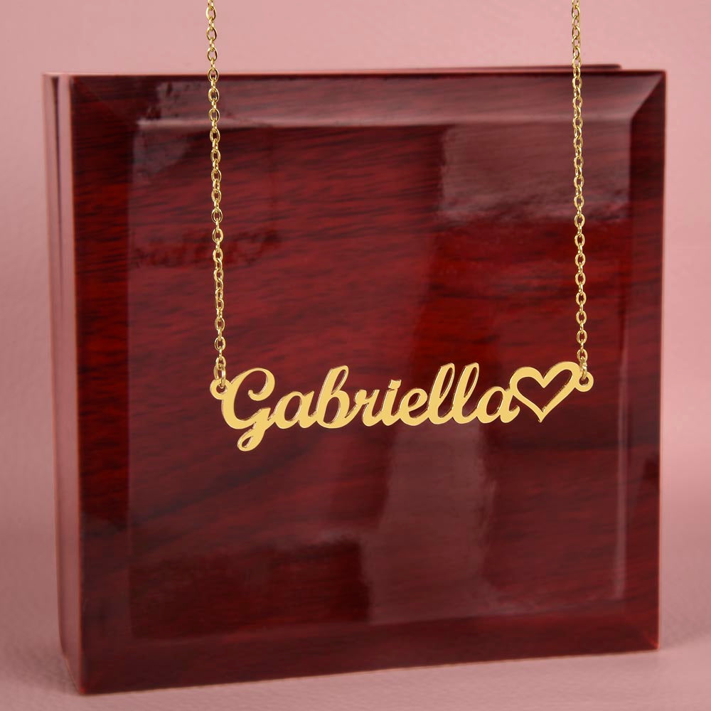 The name Gabriella in the gold personalized name necklace in front of LED Mahogany jewelry box