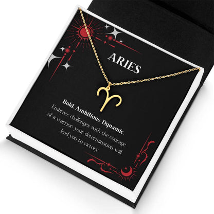 Gold Zodiac charm necklace in elegant black box, showcasing intricate astrological designs.