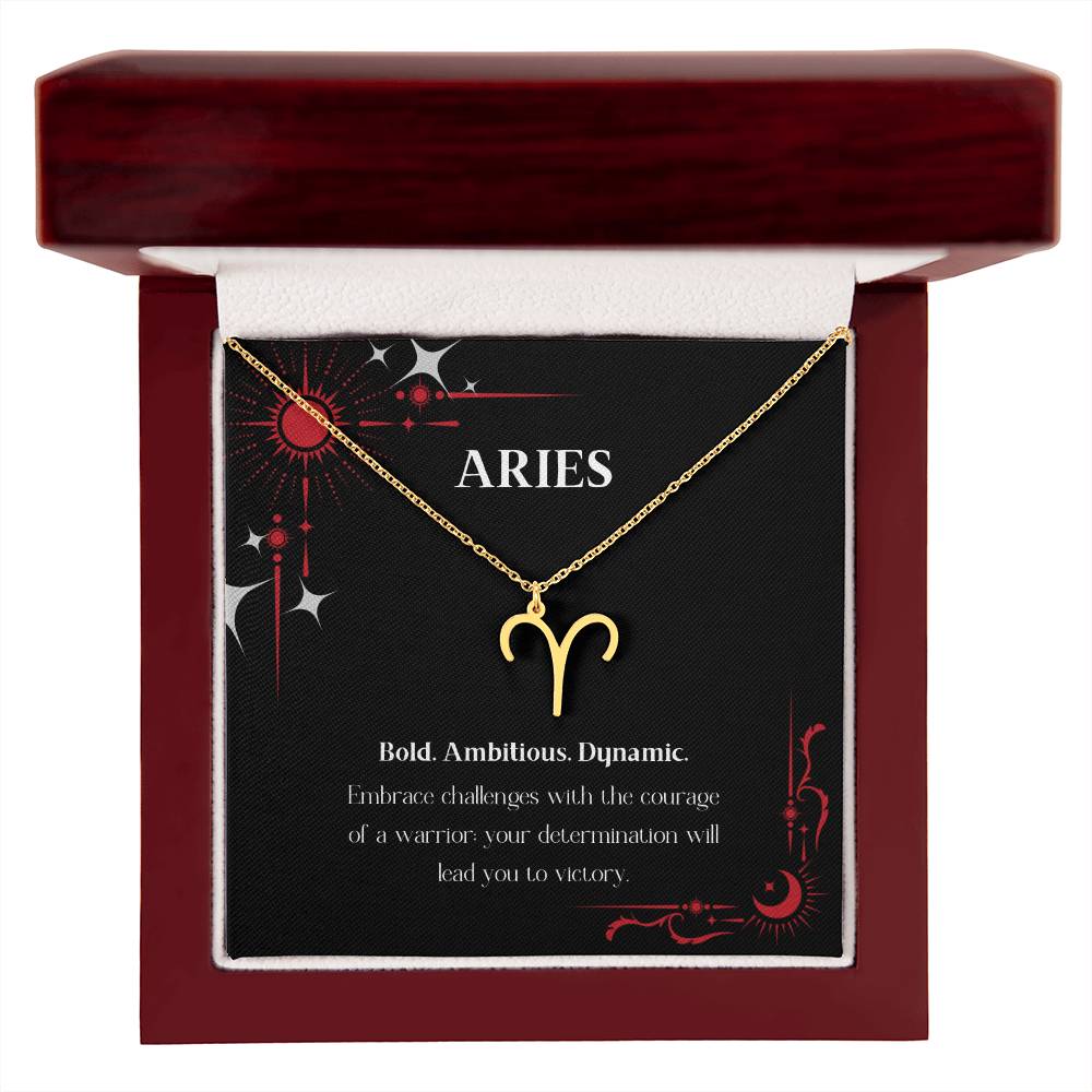 Gold Zodiac charm necklace in elegant mahogany box, showcasing intricate astrological designs.