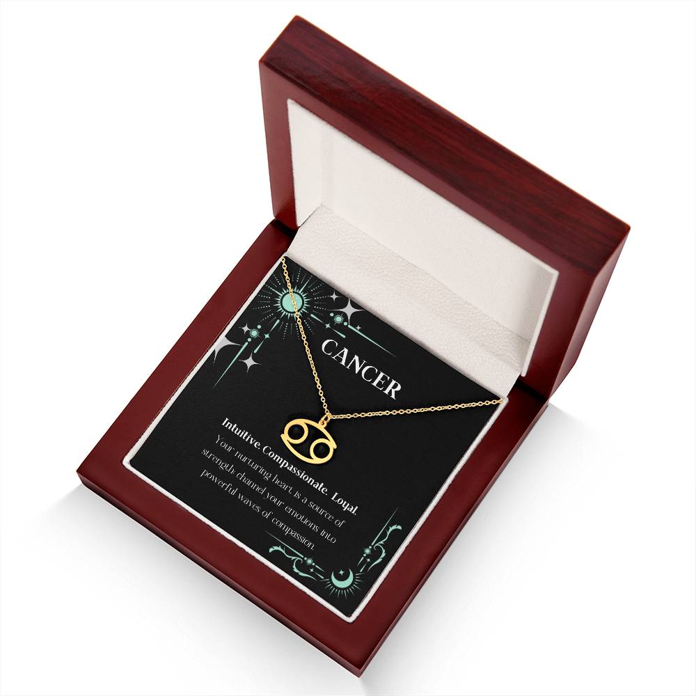 Gold Zodiac charm necklace in elegant black box, showcasing intricate astrological designs.