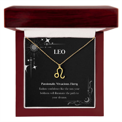 Gold Zodiac charm necklace in elegant mahogany box, showcasing intricate astrological designs.