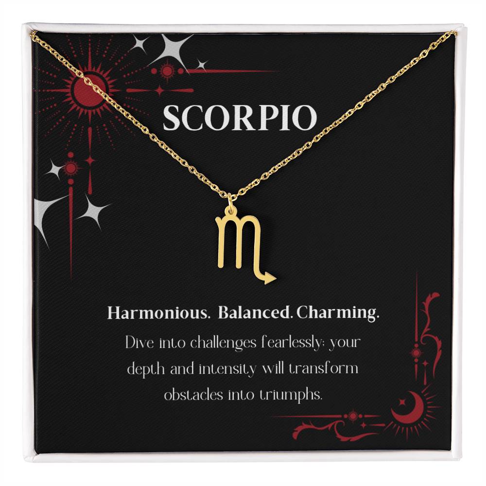 Gold Zodiac charm necklace in elegant black box, showcasing intricate astrological designs.