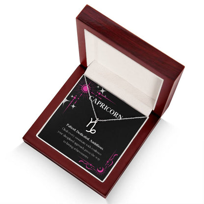 Stainless Steel Zodiac charm necklace in elegant mahogany box, showcasing intricate astrological designs.