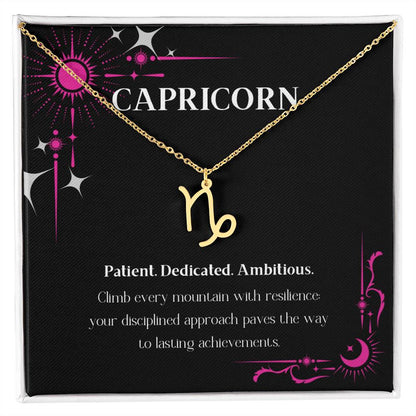 Gold Zodiac charm necklace in elegant black box, showcasing intricate astrological designs.