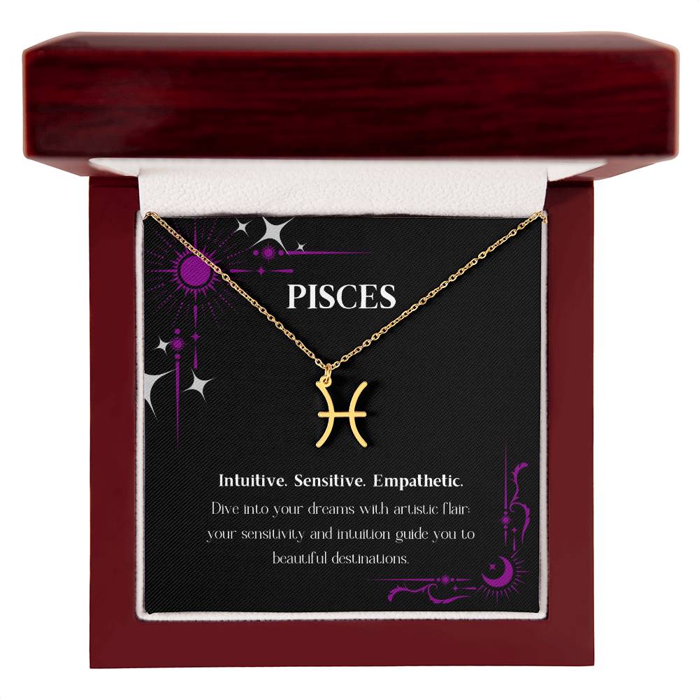 Gold Zodiac charm necklace in elegant mahogany box, showcasing intricate astrological designs.