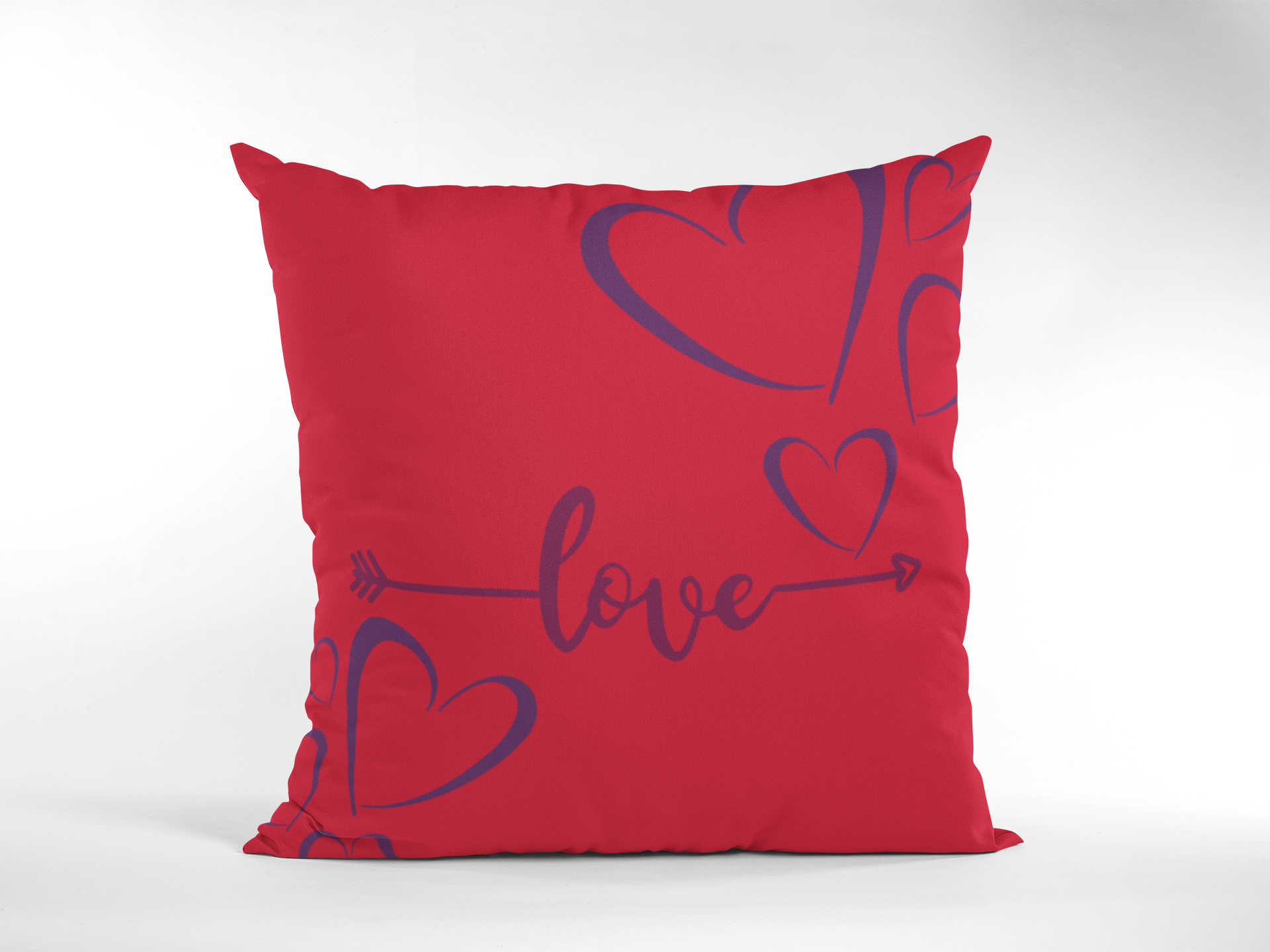 Red Low Arrow pillow standing on side.